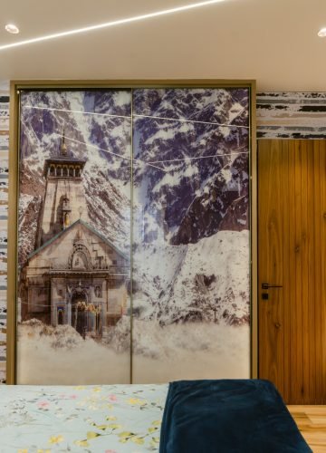 Bedroom interior with painted wardrobe mural and wooden finishes