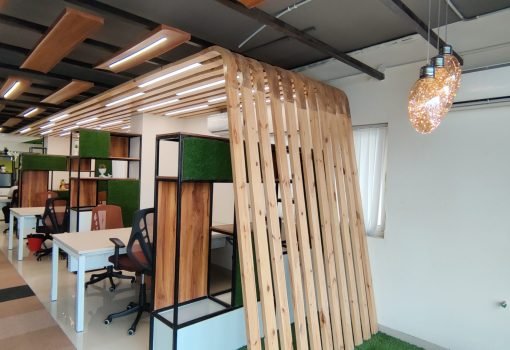 Open office workspace interior with wooden slat partitions
