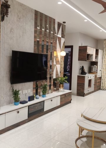 Living room TV unit with wooden panelling and display shelves
